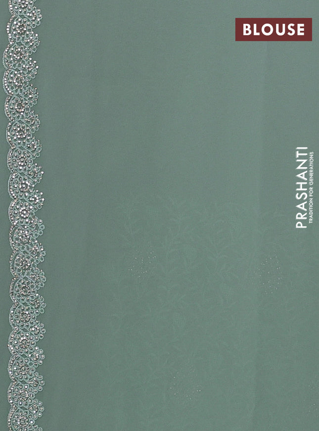 Georgette saree pastel green with allover embroidery stone work and stone work border