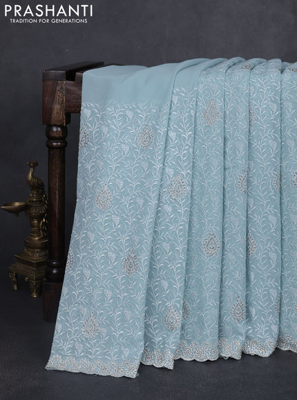 Georgette saree pastel blue with allover embroidery stone work and stone work border