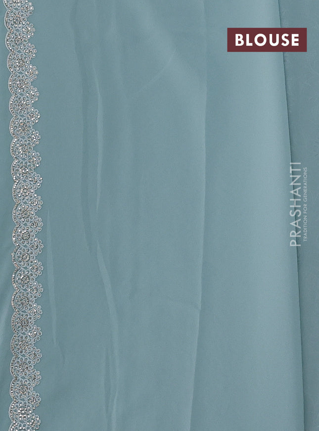 Georgette saree pastel blue with allover embroidery stone work and stone work border