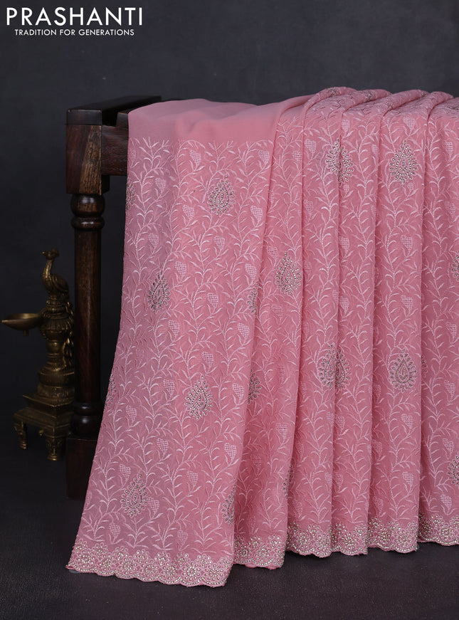 Georgette saree pastel pink with allover embroidery stone work and stone work border