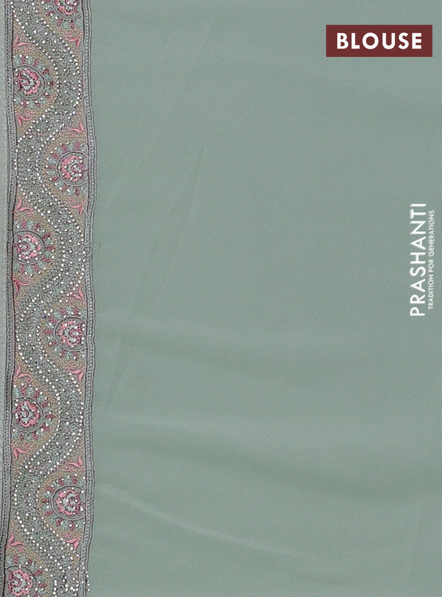 Georgette saree pastel green with allover embroidery stone work and stone work border