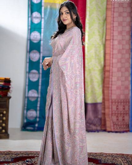 Georgette saree lavender with allover embroidery stone work and stone work border