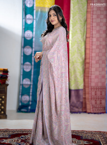 Georgette saree lavender with allover embroidery stone work and stone work border
