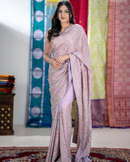 Georgette saree lavender with allover embroidery stone work and stone work border