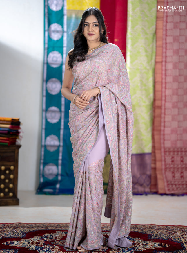 Georgette saree lavender with allover embroidery stone work and stone work border
