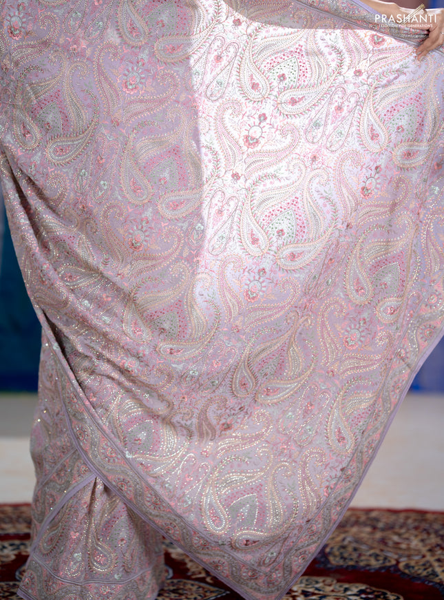 Georgette saree lavender with allover embroidery stone work and stone work border
