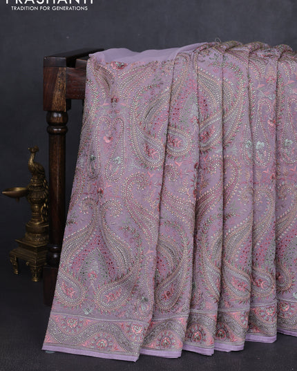 Georgette saree lavender with allover embroidery stone work and stone work border