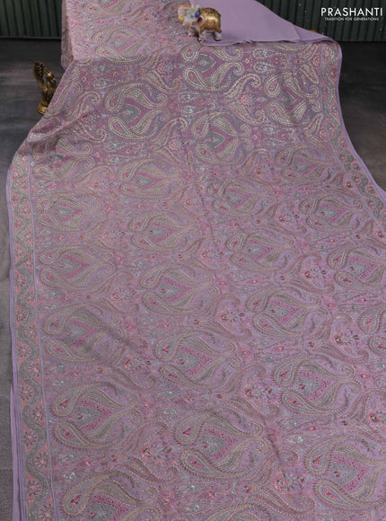 Georgette saree lavender with allover embroidery stone work and stone work border