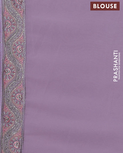 Georgette saree lavender with allover embroidery stone work and stone work border