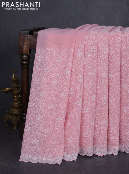 Georgette saree pastel pink with allover embroidery work and stone work border