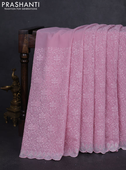 Georgette saree mauve pink with allover embroidery work and stone work border