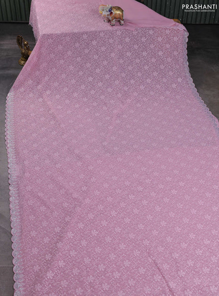 Georgette saree mauve pink with allover embroidery work and stone work border