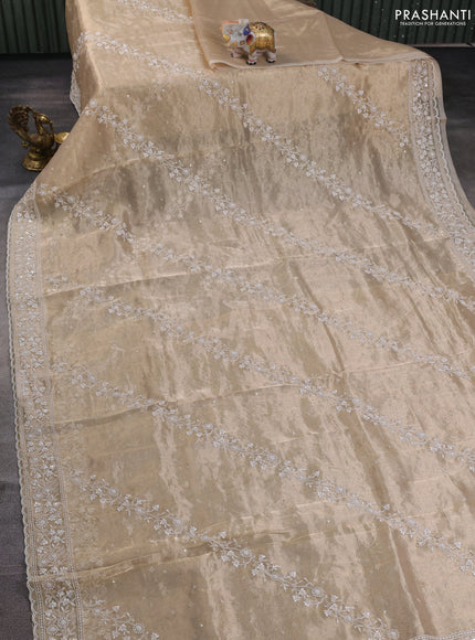 Tissue silk saree sandal with allover embroidery work and beaded work embroidery border