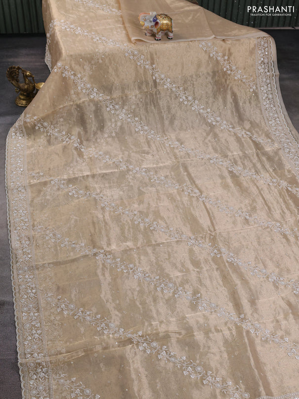 Tissue silk saree sandal with allover embroidery work and beaded work embroidery border
