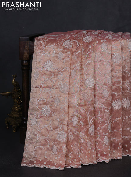 Tissue silk saree light pink with allover embroidery work and beaded work embroidery border