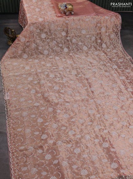 Tissue silk saree light pink with allover embroidery work and beaded work embroidery border