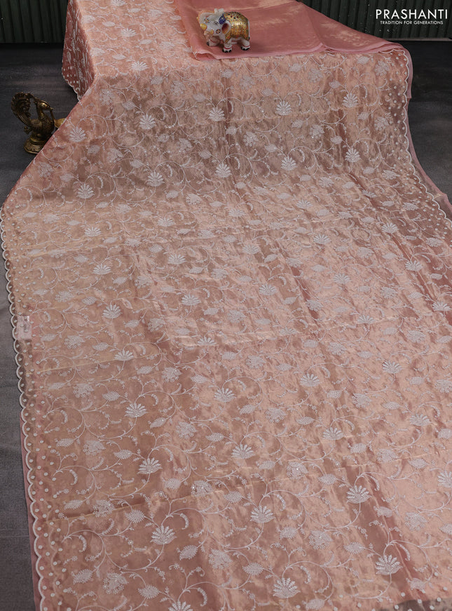 Tissue silk saree light pink with allover embroidery work and beaded work embroidery border