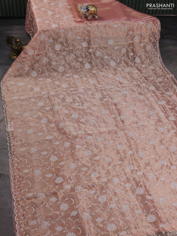 Tissue silk saree light pink with allover embroidery work and beaded work embroidery border