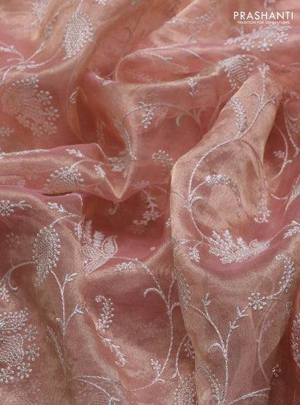 Tissue silk saree light pink with allover embroidery work and beaded work embroidery border