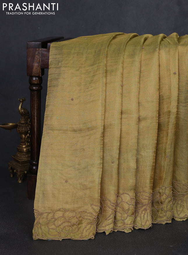 Tissue silk saree elachi green with beaded work and beaded work embroidery border
