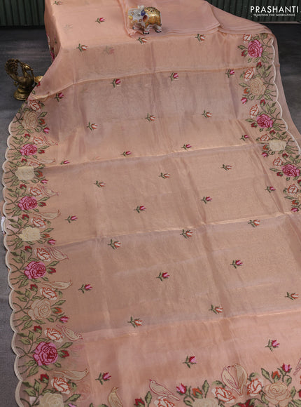 Tissue silk saree pale orange with embroidery buttas and kutch embroidery border
