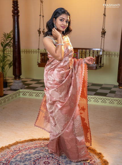 Tissue silk saree pastel pink with allover floral applique work and embroidery border