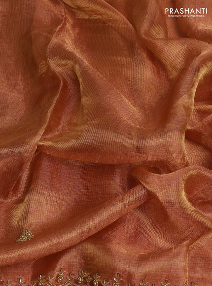 Tissue silk saree rust shade with beaded work and beaded work embroidery border