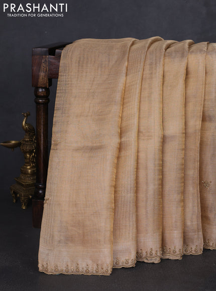 Tissue silk saree beige with beaded work and beaded work embroidery border