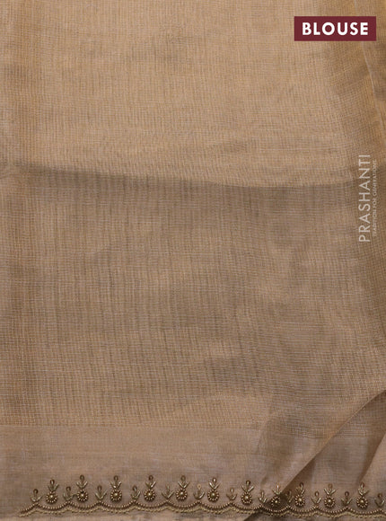 Tissue silk saree beige with beaded work and beaded work embroidery border