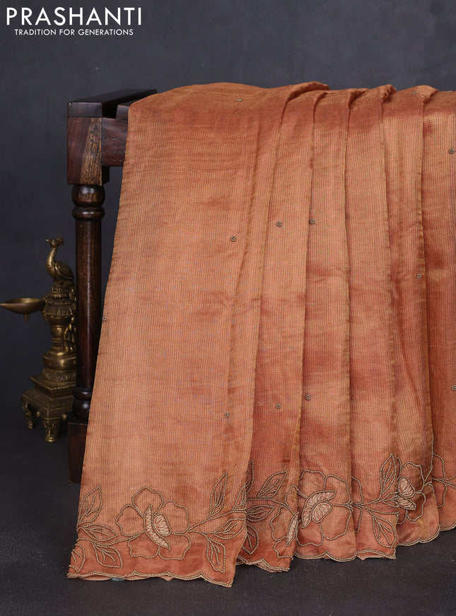 Tissue silk saree dark mustard with beaded work and beaded work embroidery border