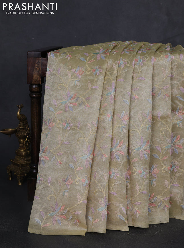 Tissue silk saree mild pista green with allover embroidery work