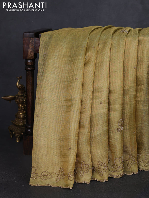Tissue silk saree dual shade of pista green with beaded work and beaded work embroidery border