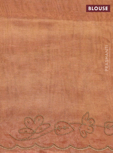 Tissue silk saree rust shade with beaded work and beaded work embroidery border