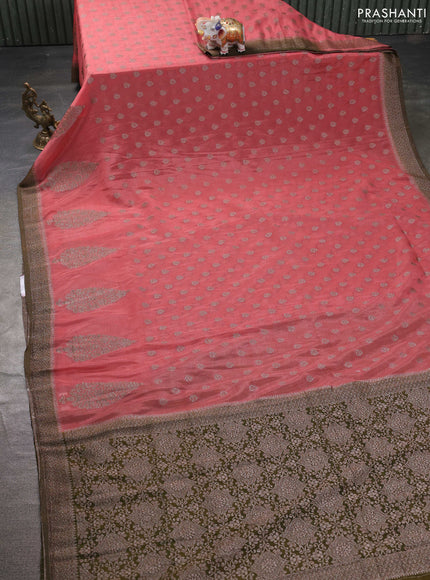 Banarasi semi georgette saree peach shade and mehendi green with allover thread & zari woven buttas and zari woven border
