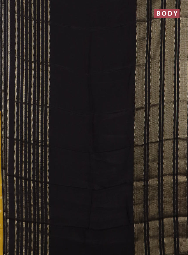 Semi mysore silk saree black and yellow with plain body and zari woven border