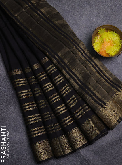 Semi mysore silk saree black and rustic orange with plain body and long zari woven border
