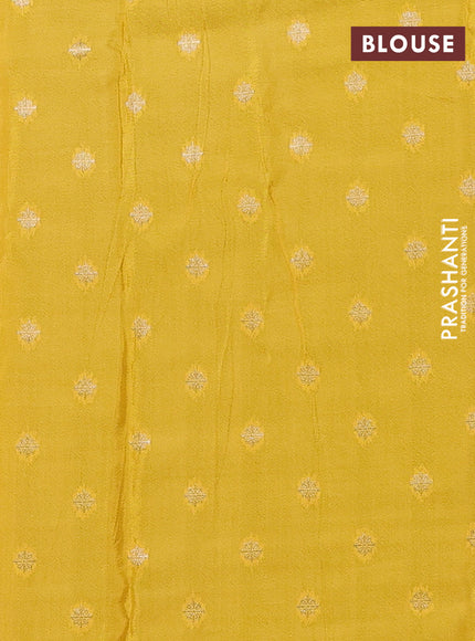 Semi mysore silk saree bottle green and yellow with plain body and long zari woven border