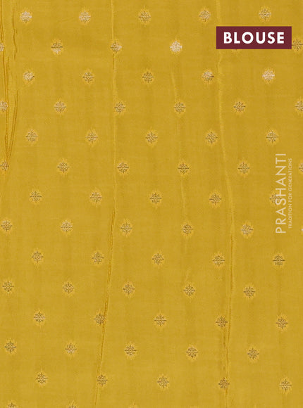 Semi mysore silk saree black and yellow with plain body and long zari woven border