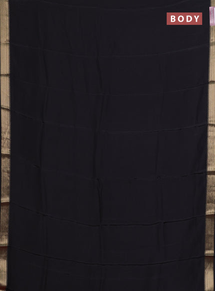 Semi mysore silk saree black and rustic orange with palin body and zari woven border