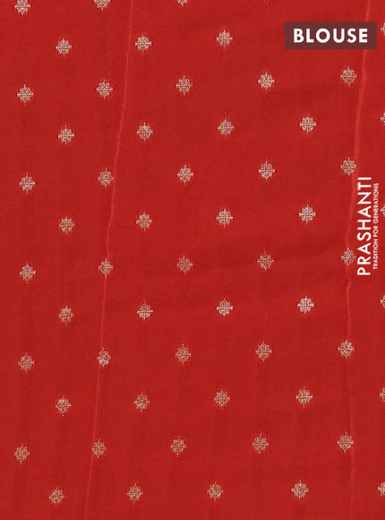 Semi mysore silk saree black and rustic orange with palin body and zari woven border