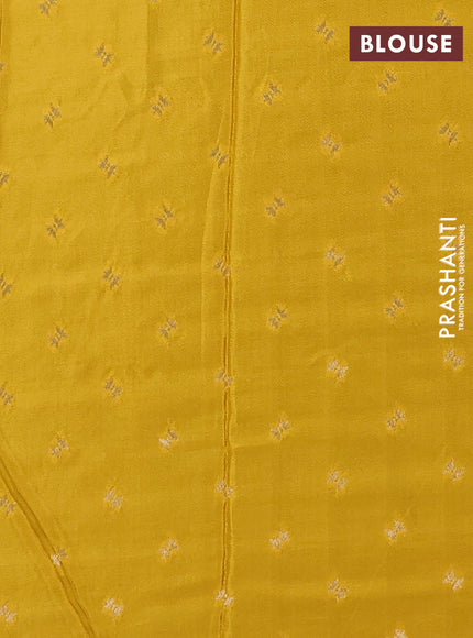Semi mysore silk saree peacock green and yellow with palin body and long zari woven border