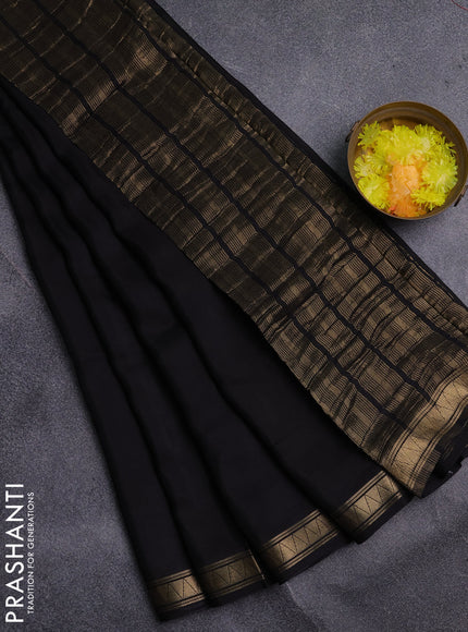 Semi mysore silk saree black and rustic orange with plain body and zari woven border
