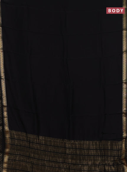 Semi mysore silk saree black and rustic orange with plain body and zari woven border