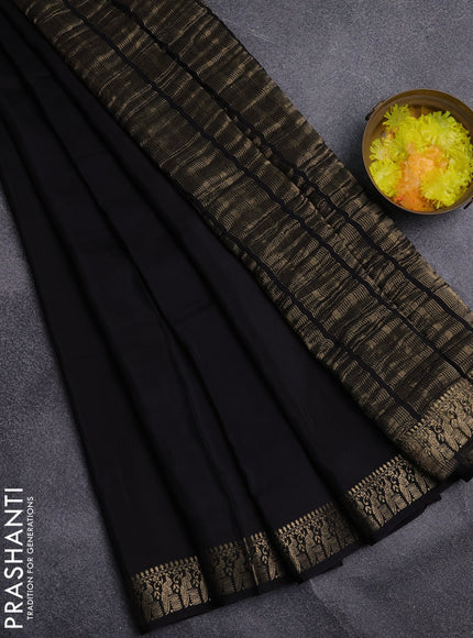 Semi mysore silk saree black and rustic orange with plain body an zari woven border