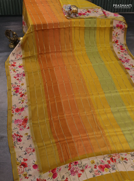 Art chiffon saree multi colour and mustard yellow with allover zari stripe pattern and zari woven printed borded