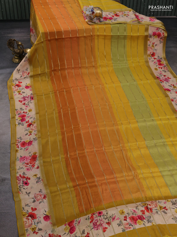 Art chiffon saree multi colour and mustard yellow with allover zari stripe pattern and zari woven printed borded