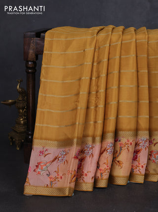 Art chiffon saree mustard yellow and pastel peach with allover zari stripe pattern and zari woven printed borded