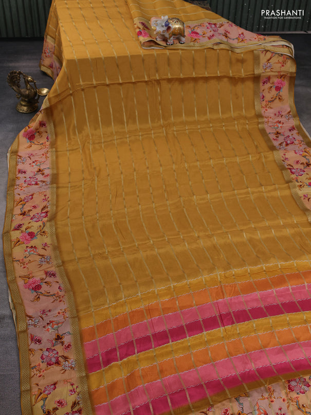 Art chiffon saree mustard yellow and pastel peach with allover zari stripe pattern and zari woven printed borded