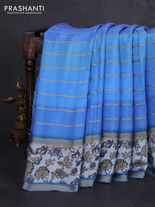 Art chiffon saree blue shade and pastel blue with allover zari stripe pattern and zari woven printed borded