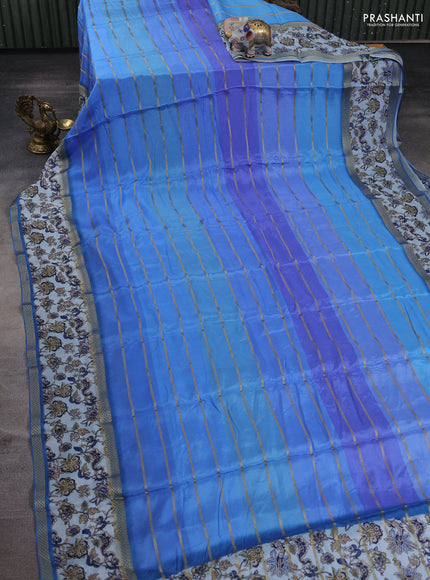Art chiffon saree blue shade and pastel blue with allover zari stripe pattern and zari woven printed borded